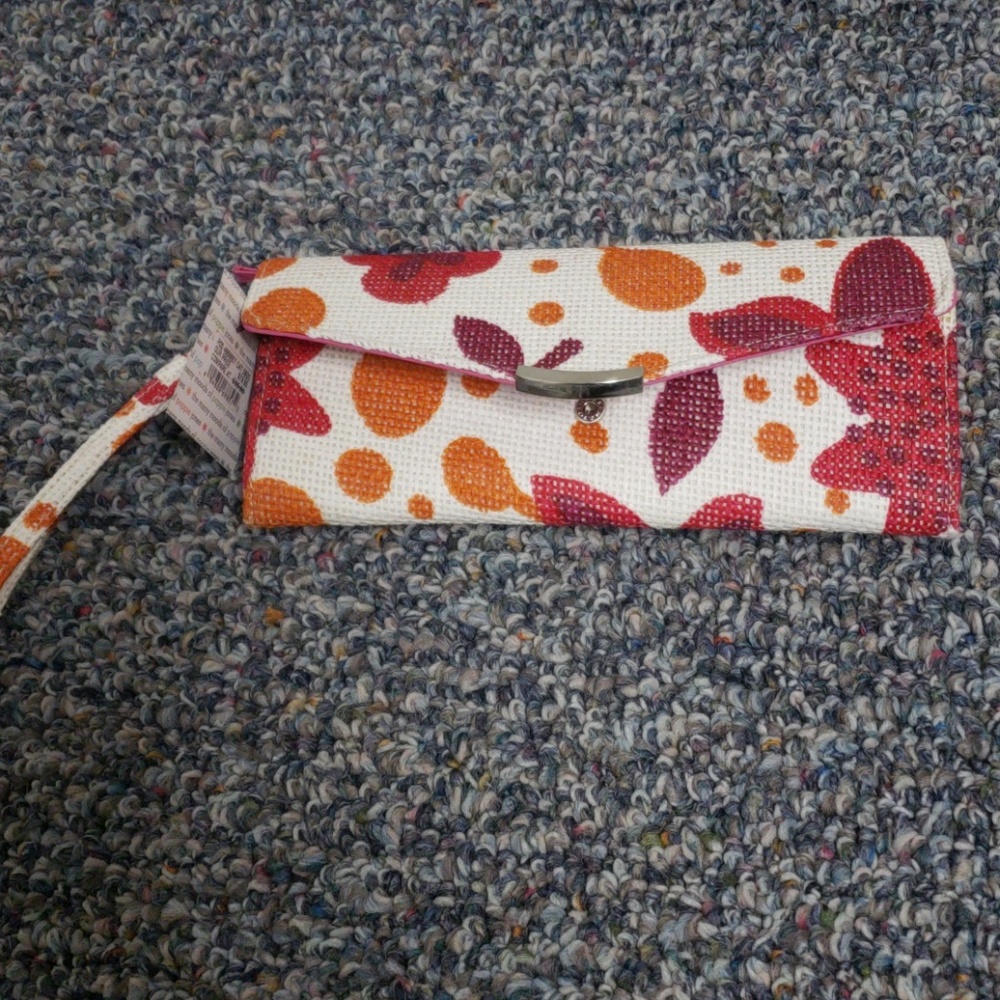 Poppies jones wristlet clutch